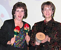Karen plays maracas and Diane plays afuche.