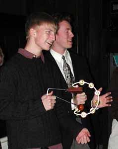 Students play vibra-slap and tambourine.