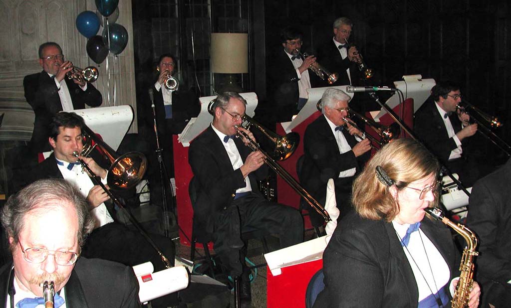 Four trumpets, four trombones, and two saxes