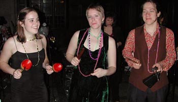 Maraca, clave, and cowbell players.