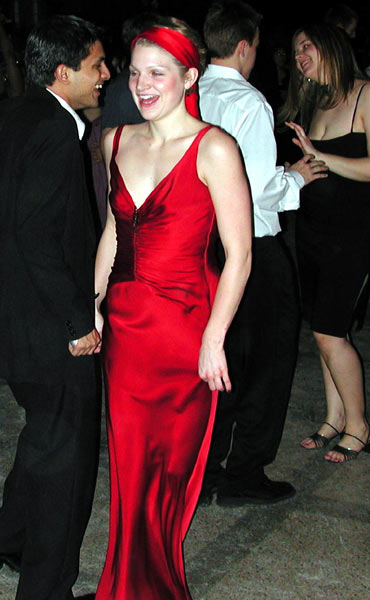 Two couples show contrasting cha cha styles.
