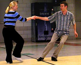 Maro and Chuck execute an energetic move.