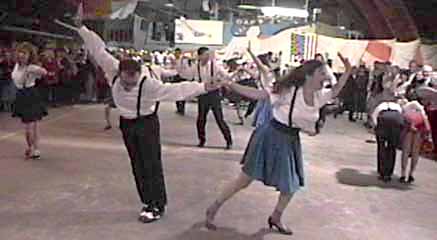 Steve Jewell and Wendy Henry in the foreground and Alice Mendelsohn and Bruce Kessler in the background strike picturesque poses on "Tuxedo Junction".