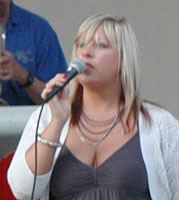 Laura sings to the back row of the amphitheatre.