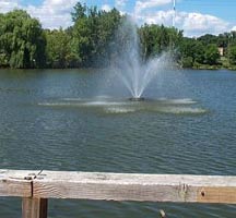 The central water jet shoots 30 feet in the air, surrounded by lower water jets that angle out from the center.