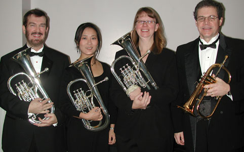 Glen, Qiuxia, Cami, and Ken pose with their horns.