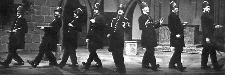 Glen and seven other policemen look noble.
