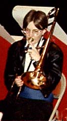 Julie plays trombone wearing the Roseville Big Band's blue tie and cummerbund.