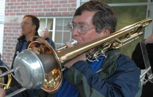 Tom plays a muted bass trombone solo