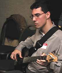 Tim concentrates on a bass line.
