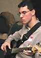 Tim plays electric bass