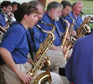 Deb and Glen play tenors, Dan and Bill F. play altos, and Bill P. plays baritone sax.