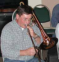 Tom plays an E-flat.