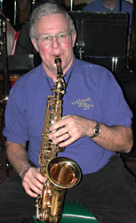 Dave looks at the camera while playing.