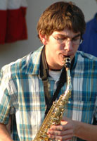 Andy looks down at the chords.