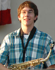 Andy smiles at the audience.
