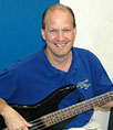 Kent plays bass