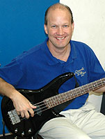 Kent smiles at the camera