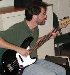 Dick plays electric bass.