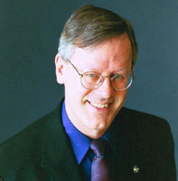 Jim smiles at the camera.