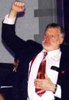 Jim tenBensel gave the Minneapolis Trombone Choir a cutoff during their February, 2000, concert.
