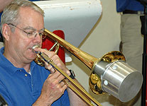 Mike plays with a Joral bucket mute.