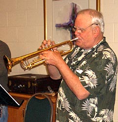 Corky plays trumpet